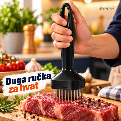 Hvat duge ovalne ručke iznad komada mesa