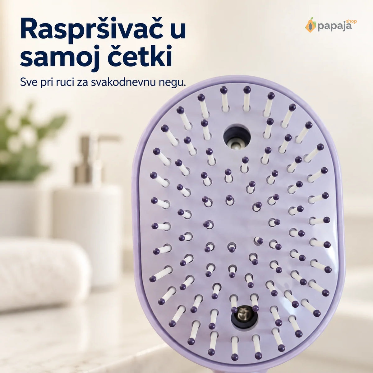 Prednja strana svetloljubičaste četke sa dva otvora između belih zubaca